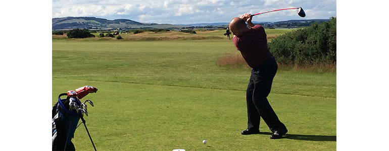 Steve Cash golfing at Balgove Course in St. Andrews, Scotland